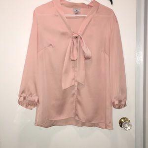 Smooth and sleek pink blouse